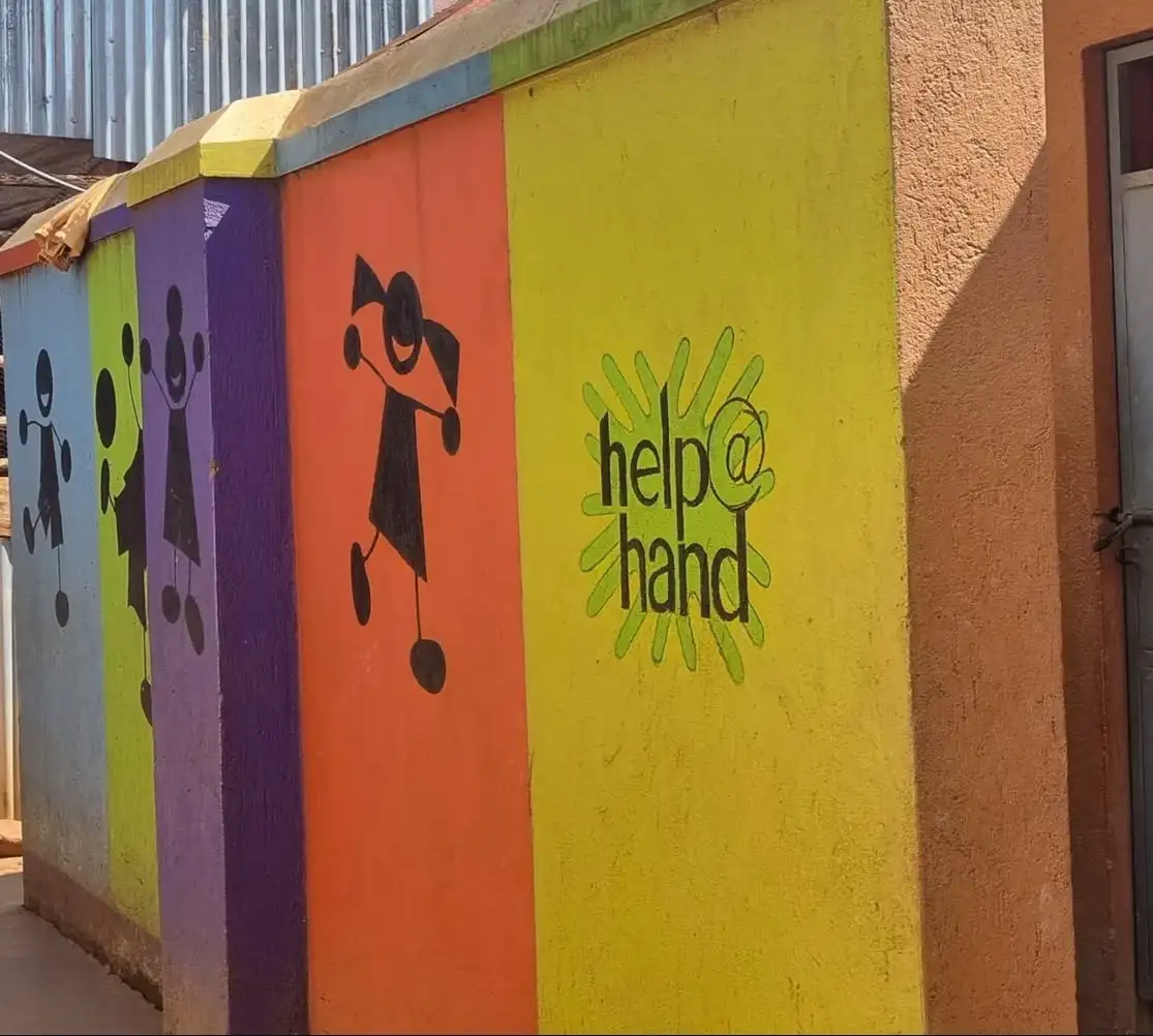 Help at hand on a painted wall